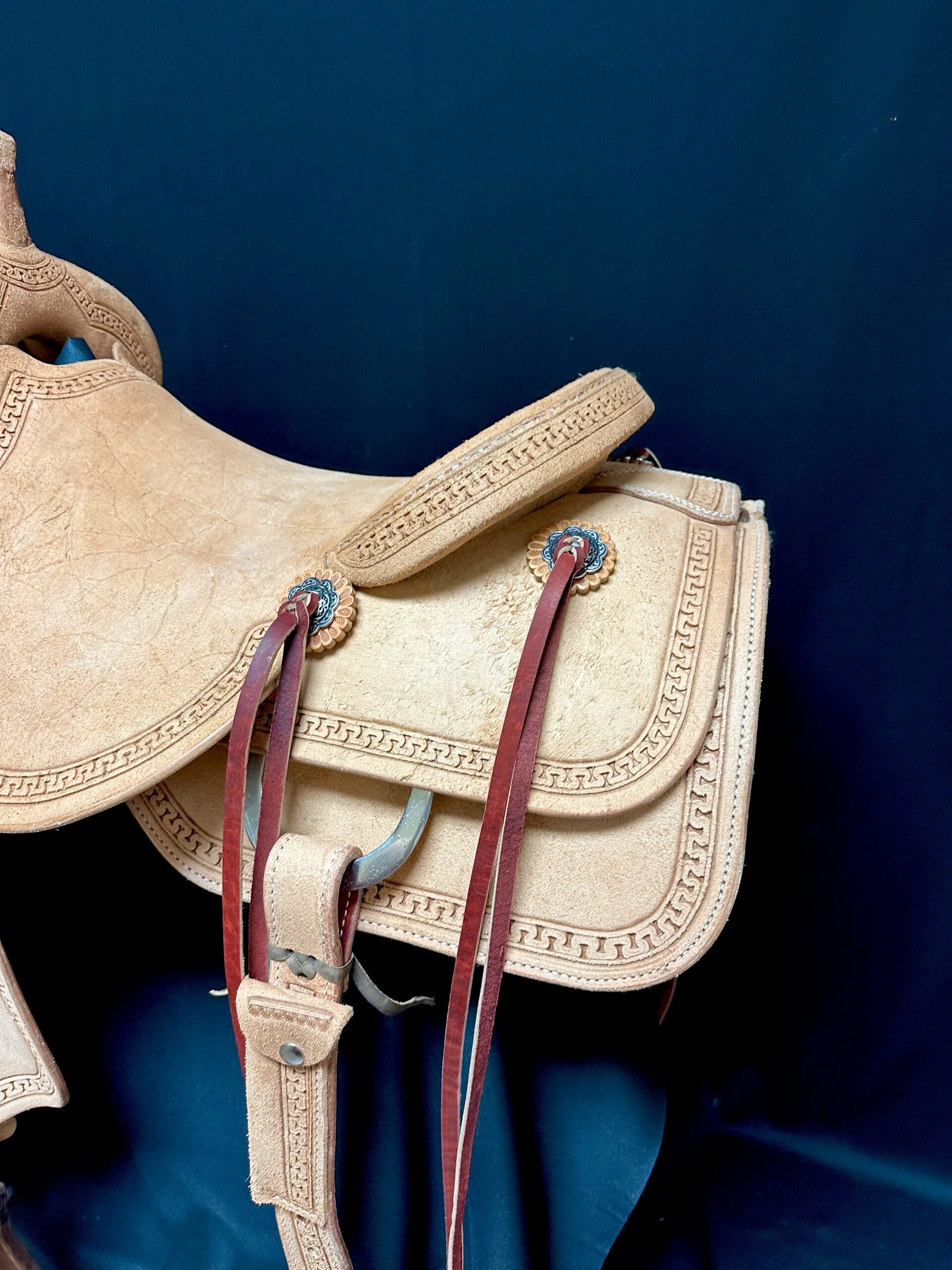 White Rock Ranch Cutter with Snake Border tooling on light oiled leather